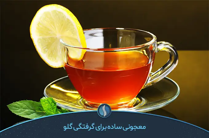 لیوان چایی با یک تکه لیمو ترش در کنارش مکمل موثری کنار غذا برای سرماخوردگی|ژین طب